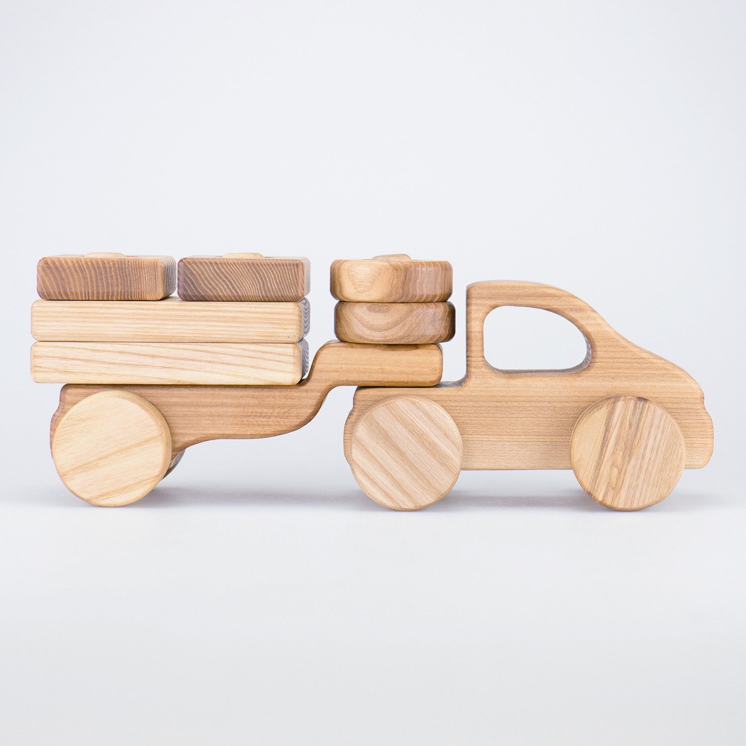 spielzeug bio Holz LKW zum Stecken von Lotes Toys · Bio Spielzeug