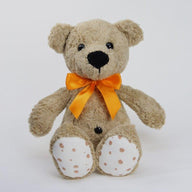 Steiner Bio Teddybär Bruno in braun mit schwarzen Augen & orangem Halsband