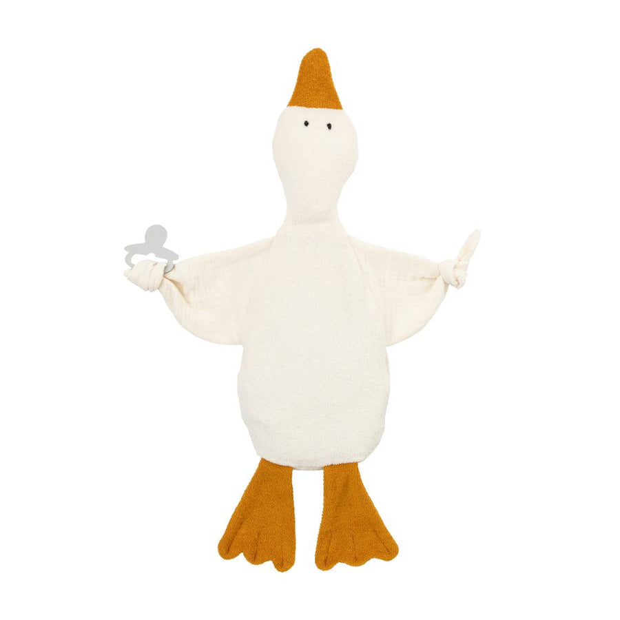 Weiches Wärmekissen mit Kirschkernfüllung in Form einer Gans aus Bio-Baumwolle mit senfgelben Füßen und Schnabel sowie integriertem Beißring für Babys.