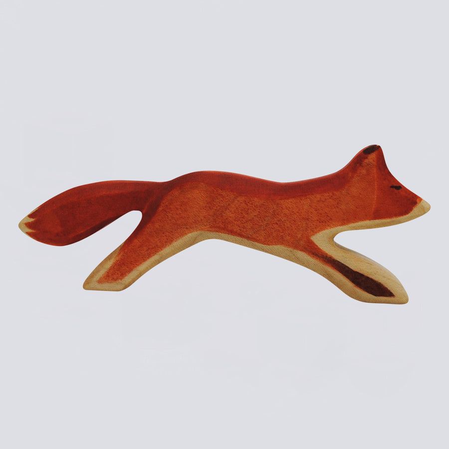 Holzwald Holzfigur Fuchs laufend