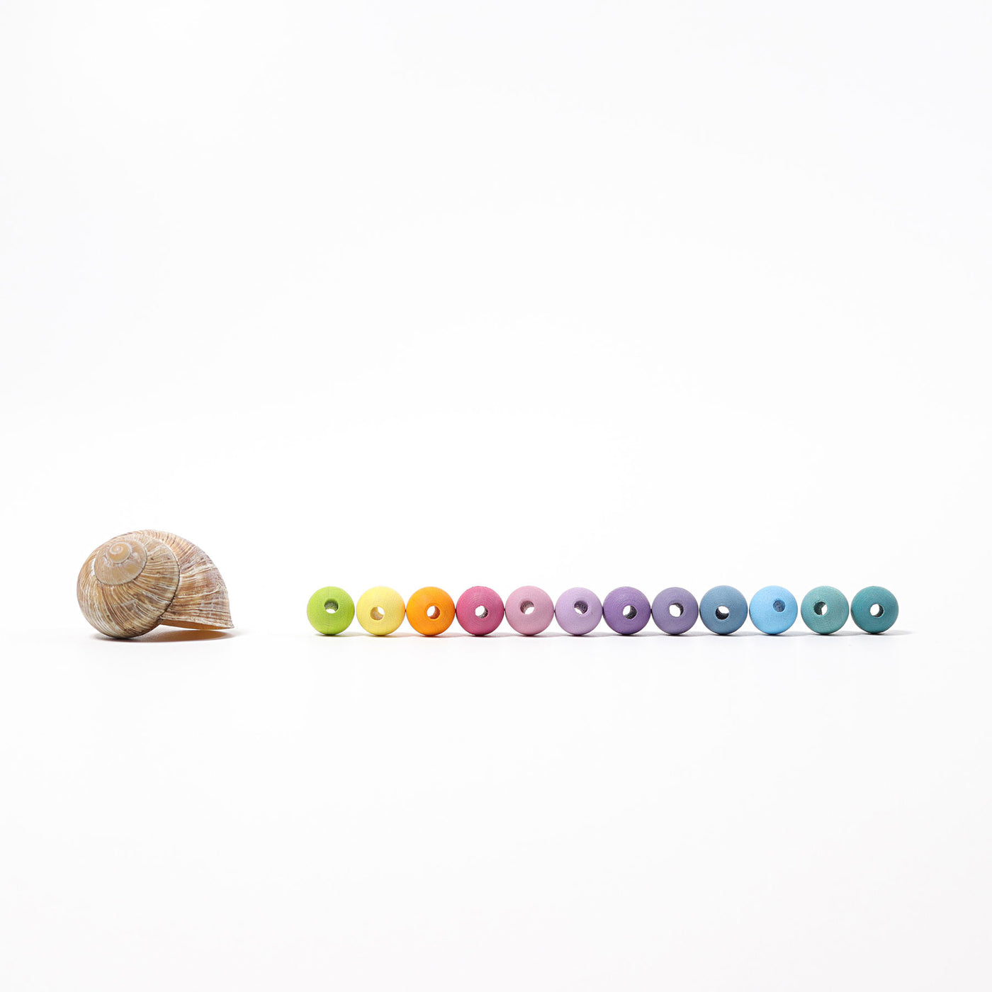 bio-spielzeug_grimms_10259_kleine_pastell_holzperlen_v3g9mux78eqvjj6